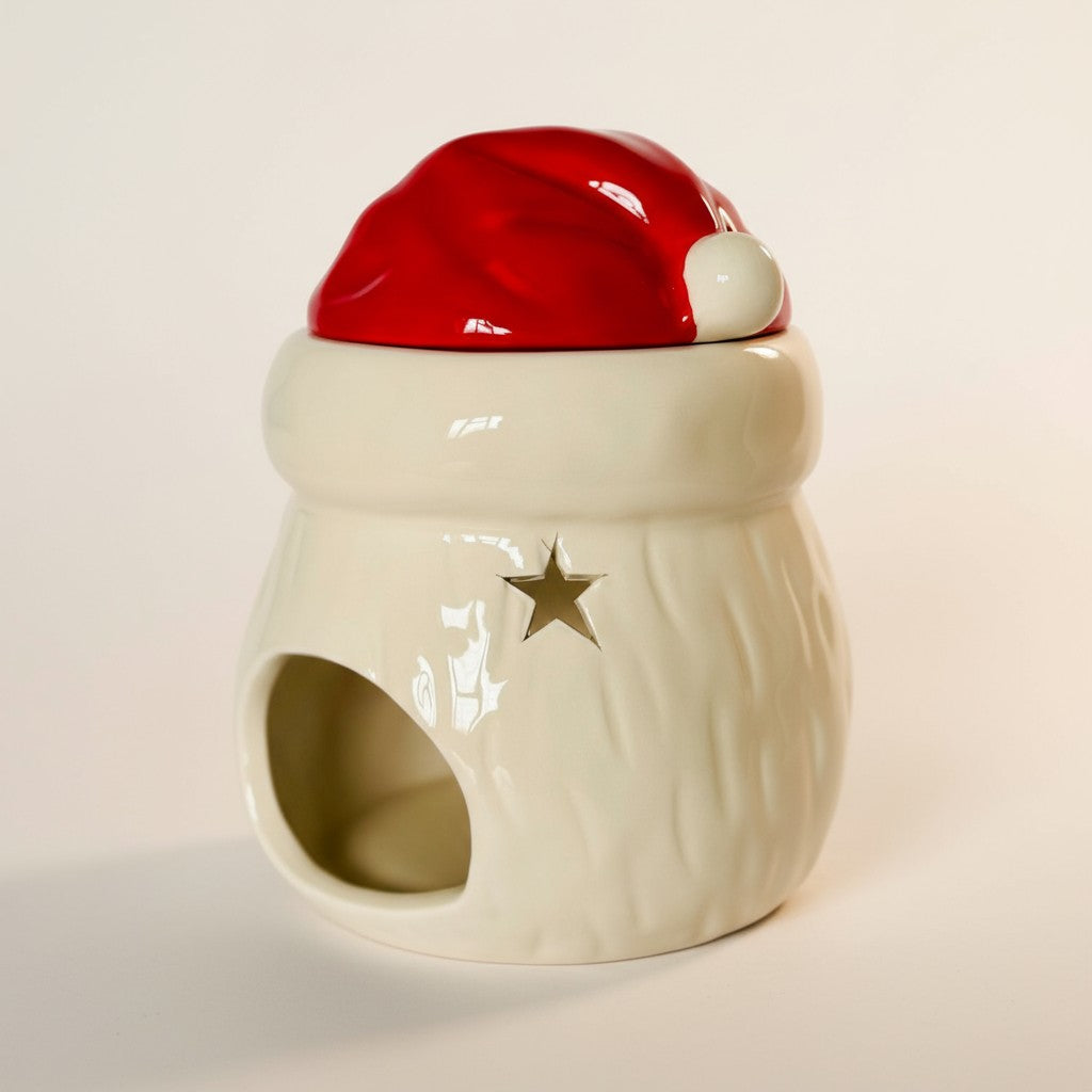 Santa Claus Wax Burner facing the back showing where the teaight would go, on a plain white background.