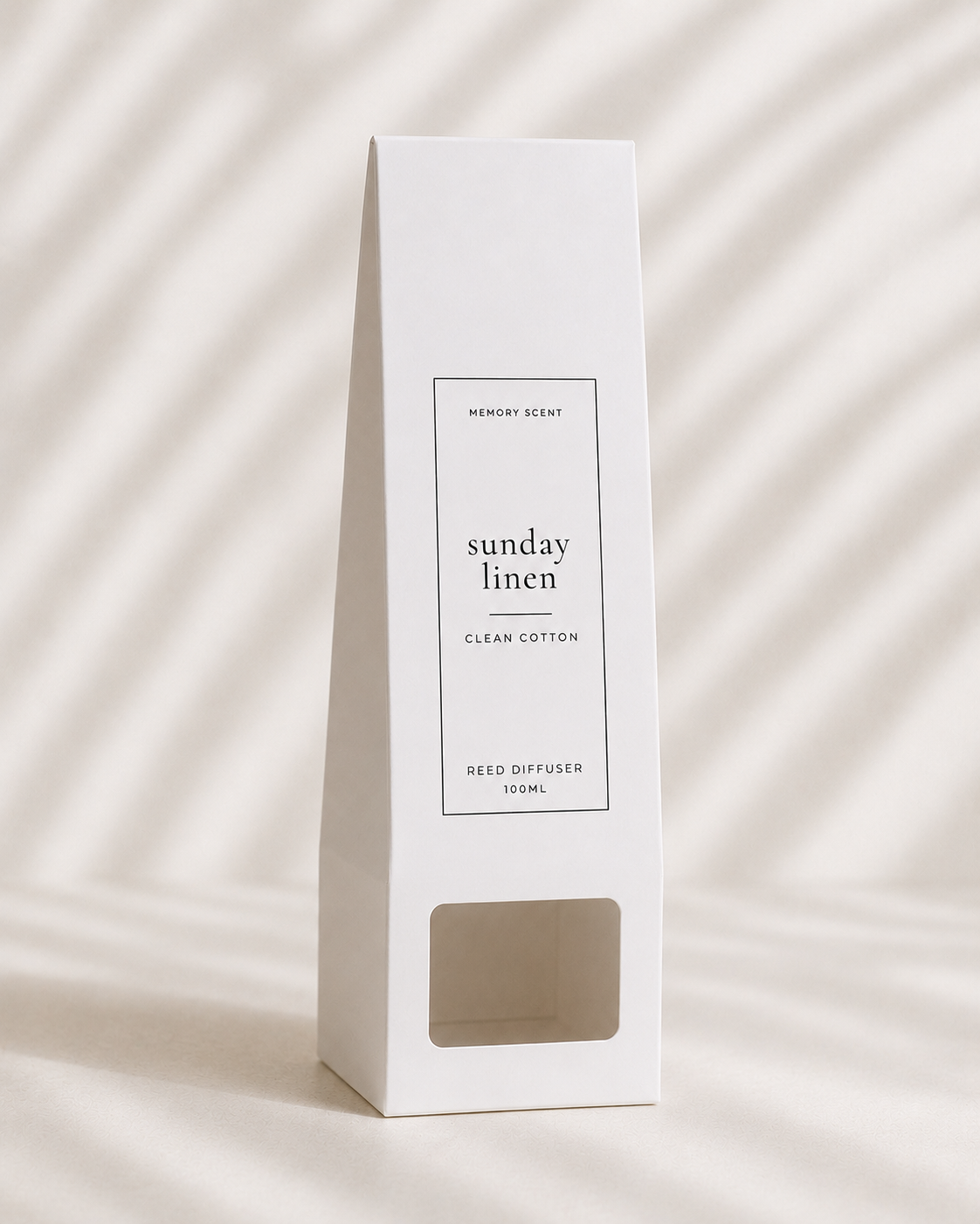 White reed diffuser packaging labeled 'Sunday Linen' on a light background