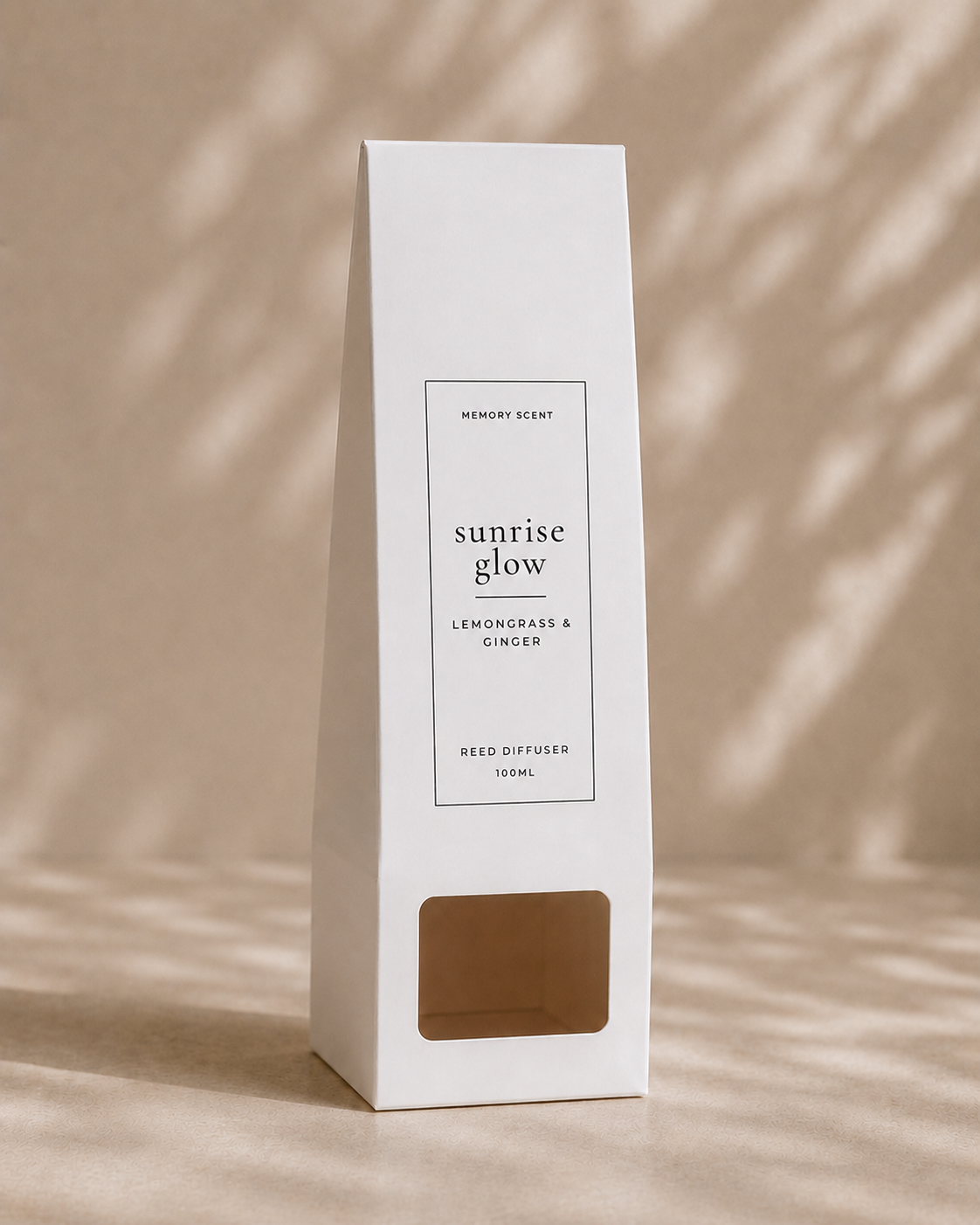 White diffuser packaging of the 'sunrise glow' product on a beige background