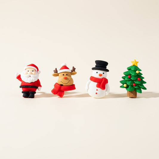 Set of Christmas-themed figurines including Santa Claus, reindeer, snowman, and tree on a beige background