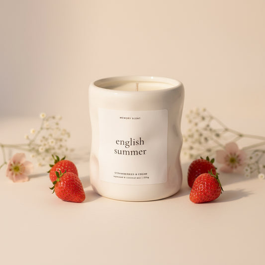 English Summer Mother’s Day candle styled with fresh strawberries and flowers