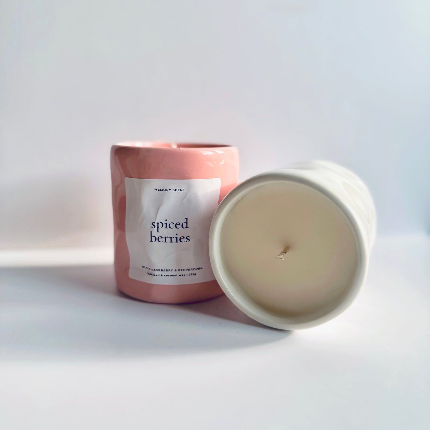 Spiced Berries Mother’s Day candle in pink and white jars scented with black raspberry and peppercorn