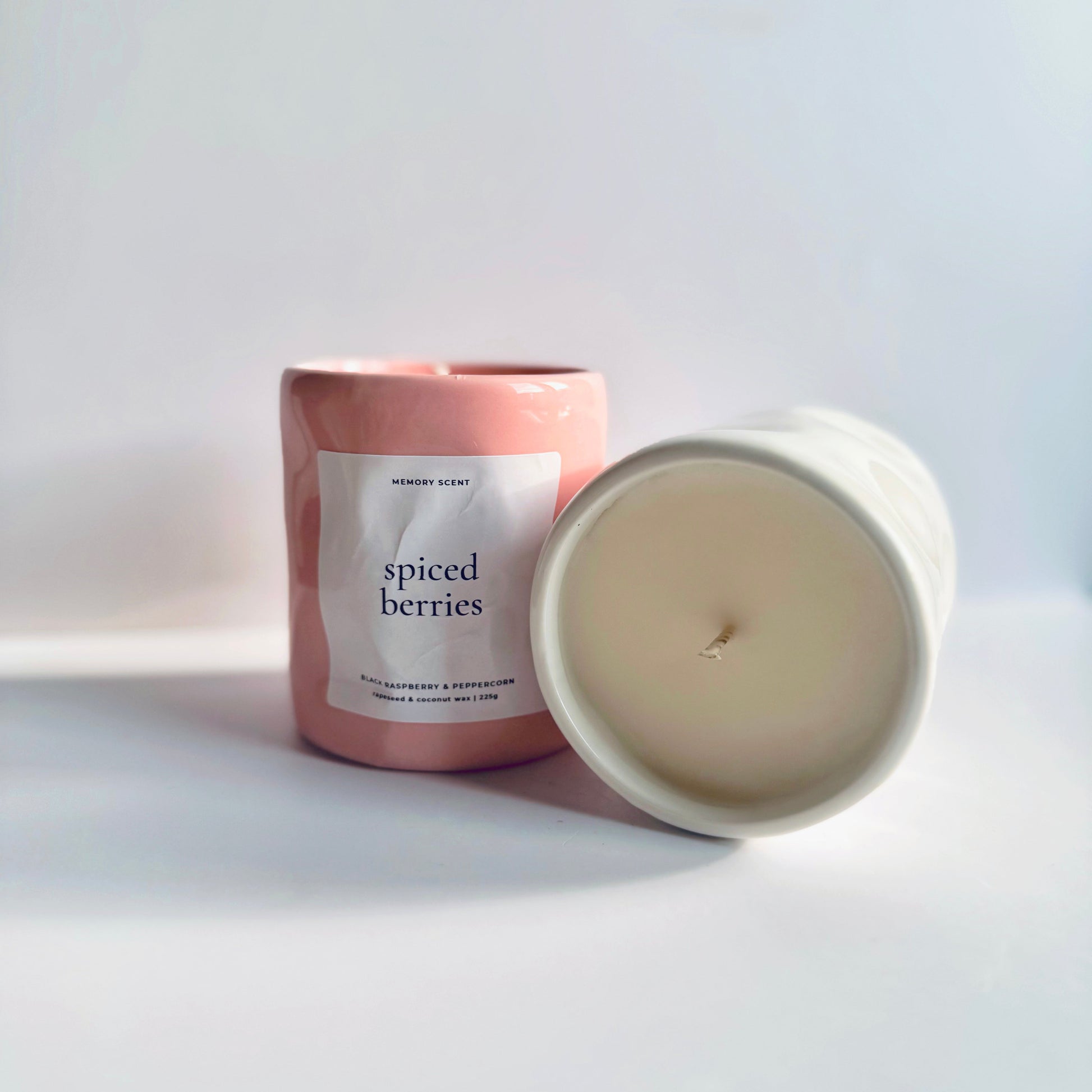 Spiced Berries Mother’s Day candle in pink and white jars scented with black raspberry and peppercorn